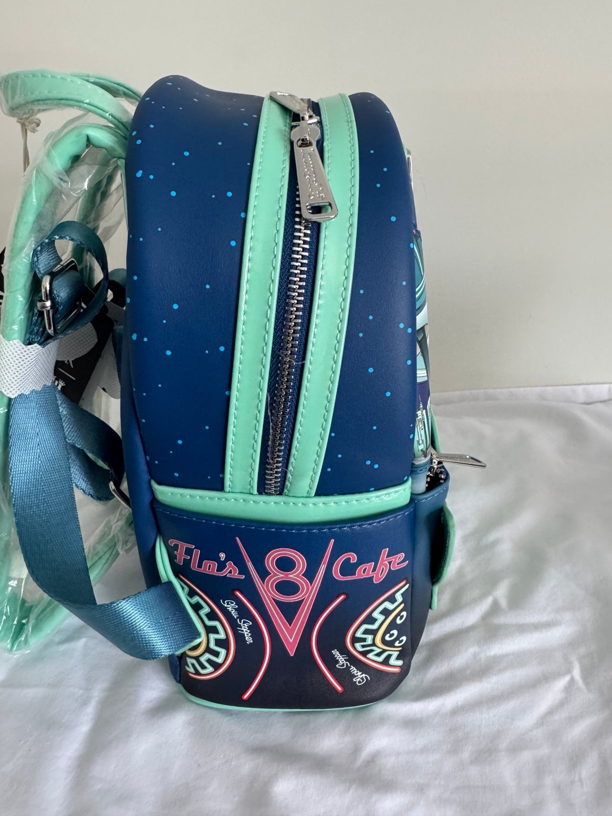 Loungefly Disney Pixar Cars Flo’s V-8 Cafe GITD Mini Backpack