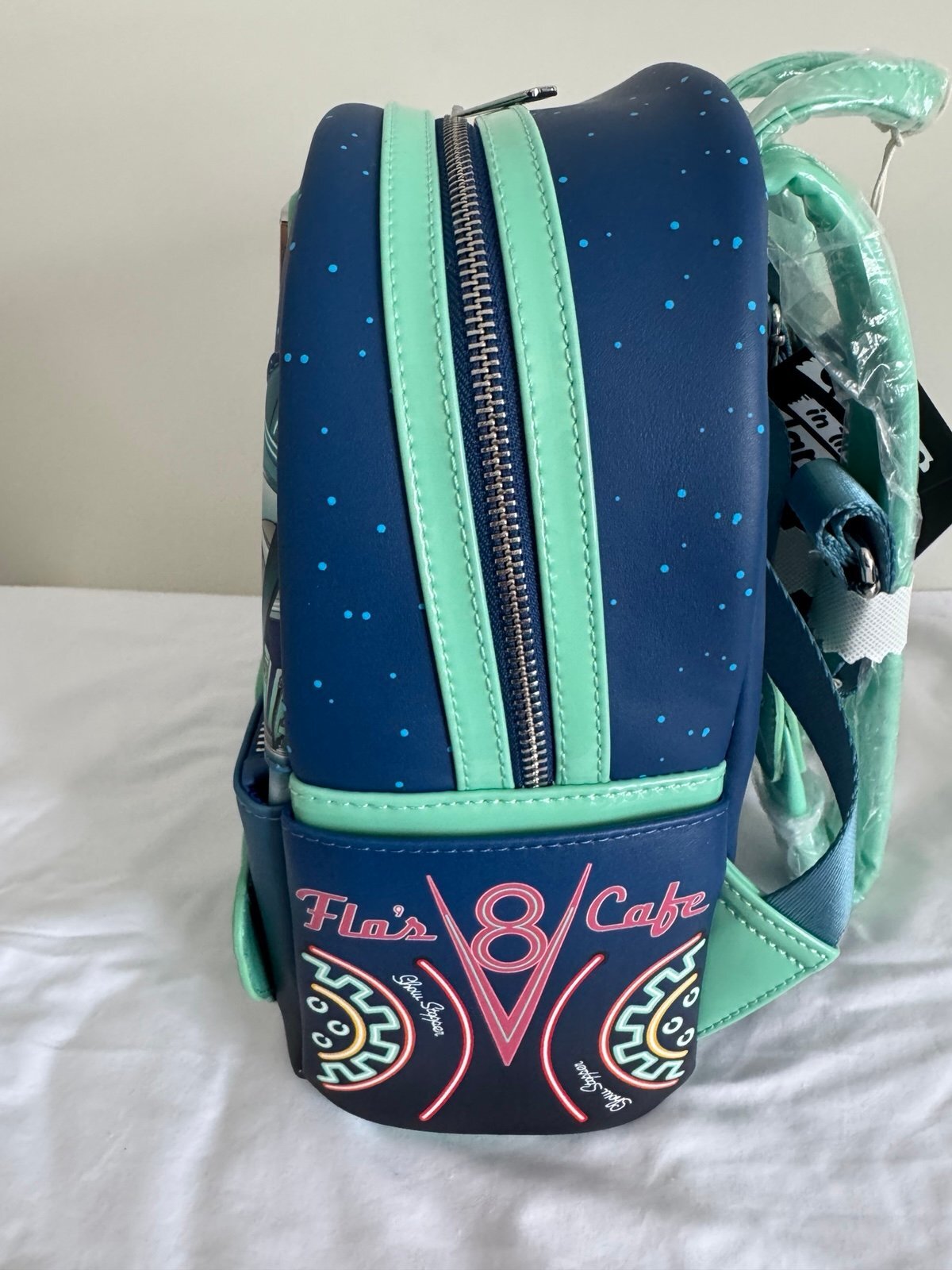 Loungefly Disney Pixar Cars Flo’s V-8 Cafe GITD Mini Backpack