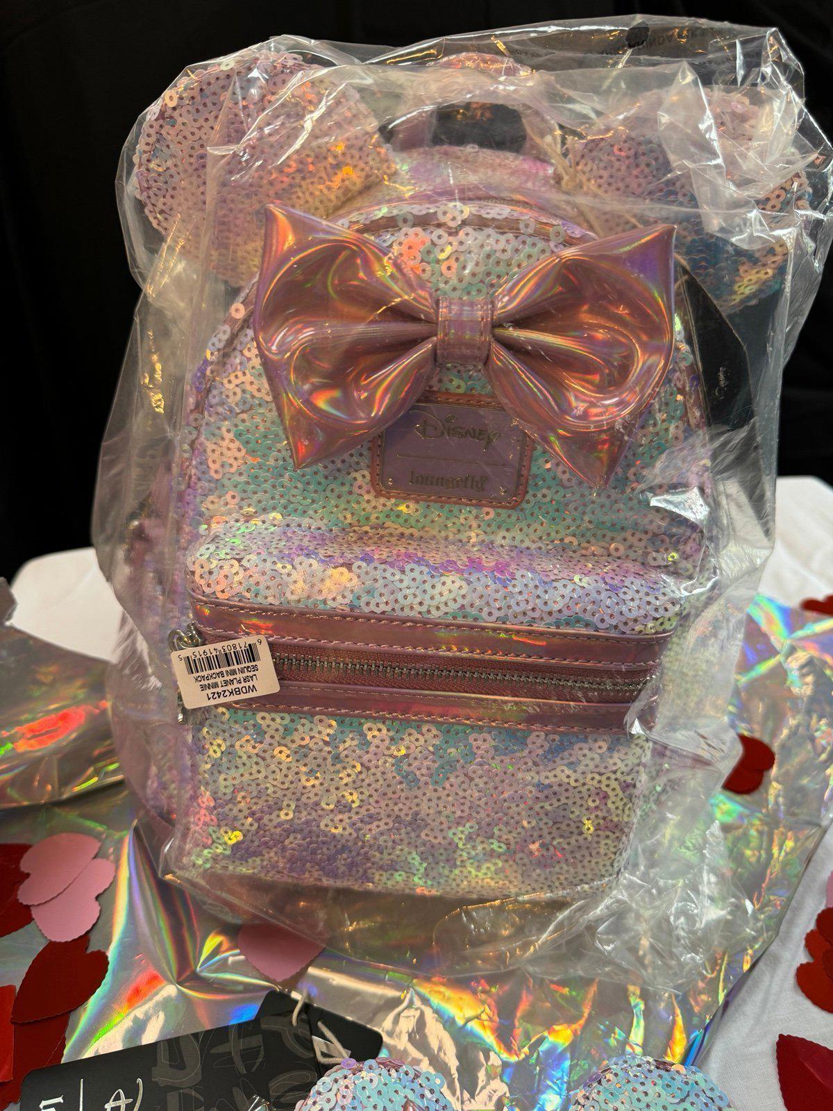 Loungefly Disney Planet Minnie UV Reactive Pink Iridescent Sequin Backpack