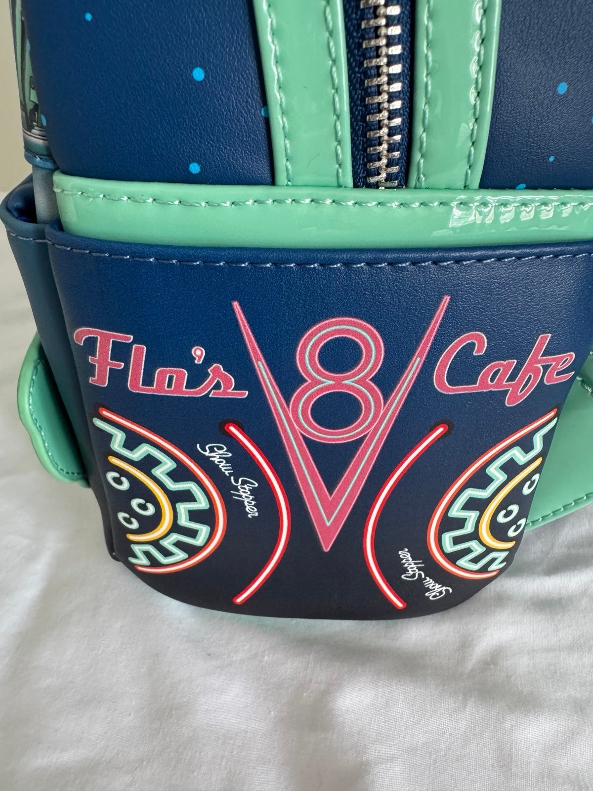 Loungefly Disney Pixar Cars Flo’s V-8 Cafe GITD Mini Backpack