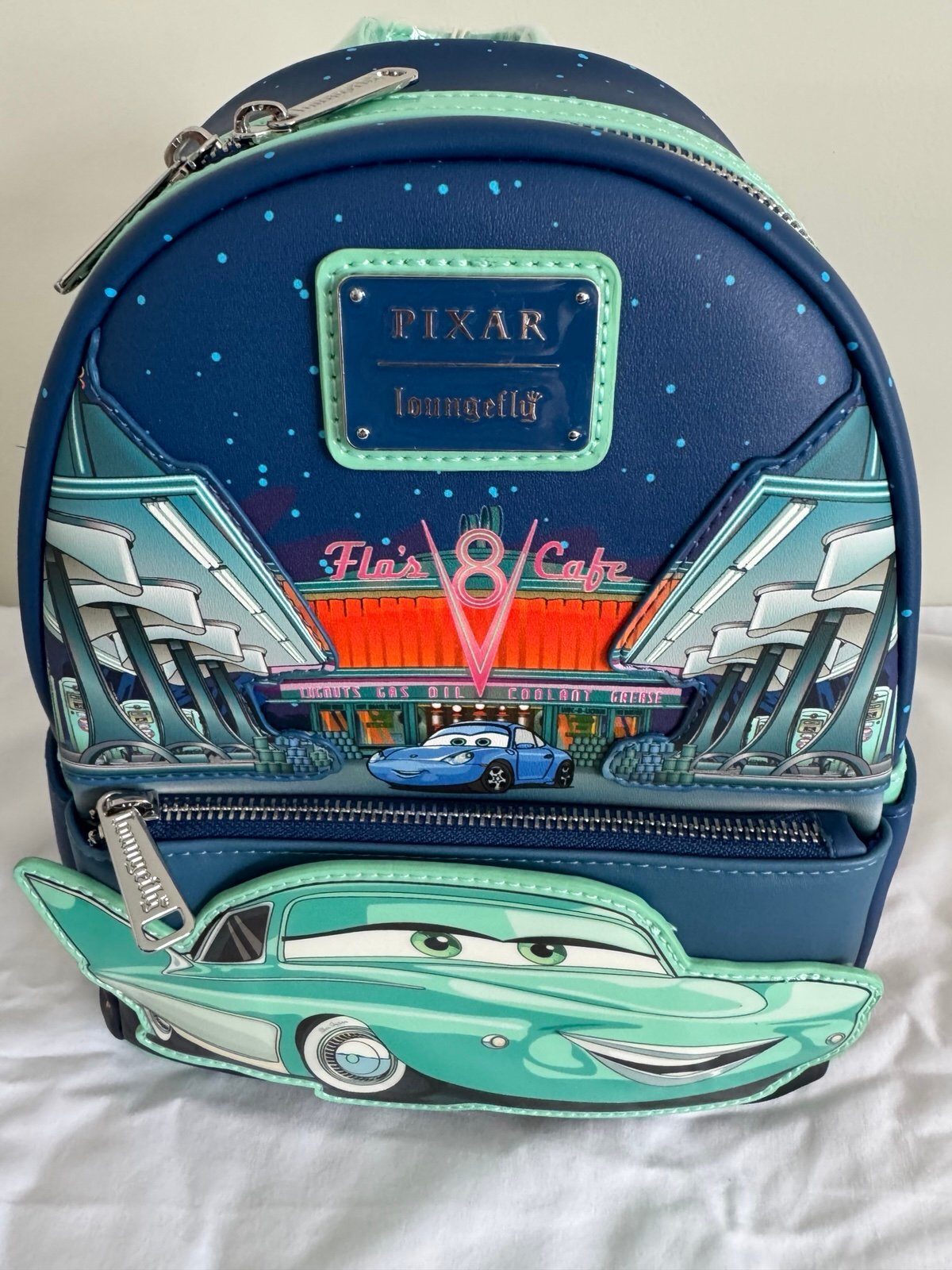 Loungefly Disney Pixar Cars Flo’s V-8 Cafe GITD Mini Backpack