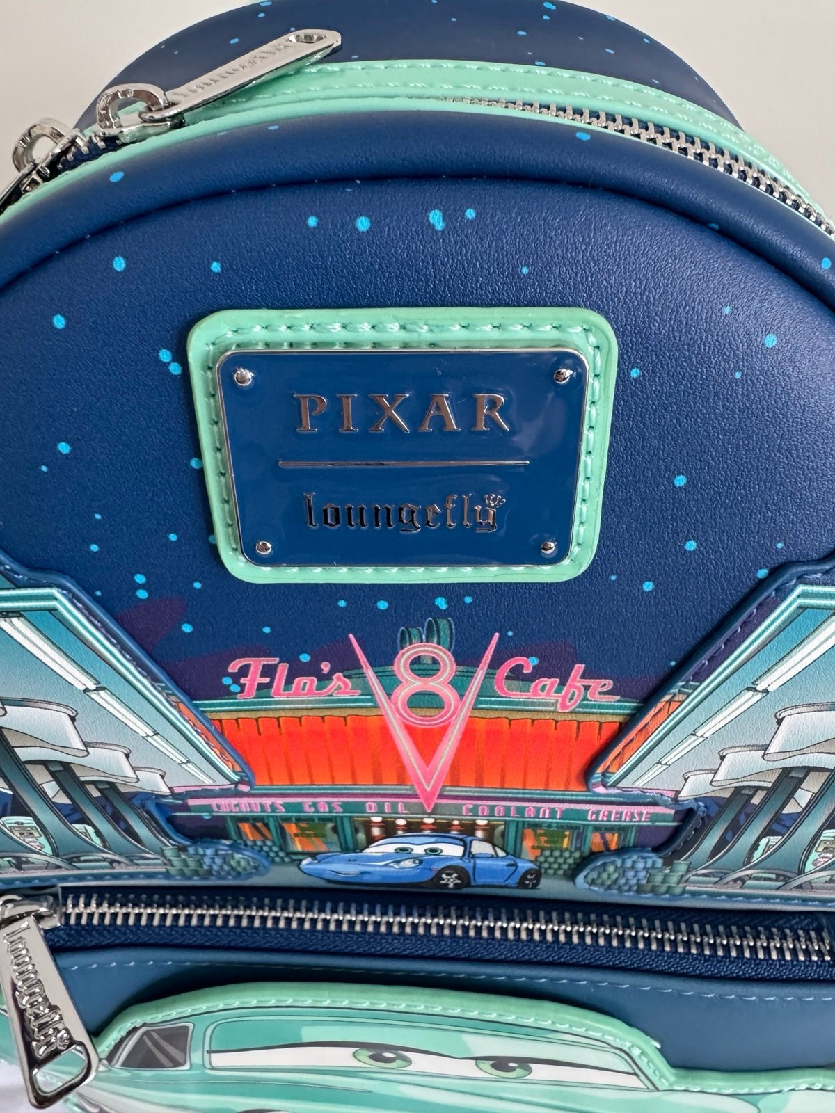 Loungefly Disney Pixar Cars Flo’s V-8 Cafe GITD Mini Backpack